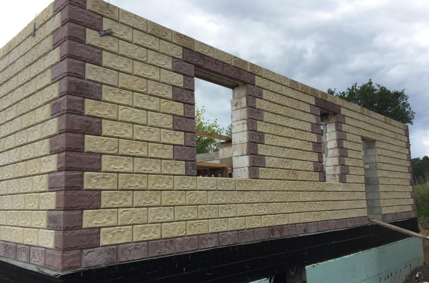 Facing the façade of the basement of a house with building blocks